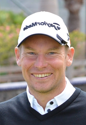 Porträttbild på golftränare Robert Johansen.